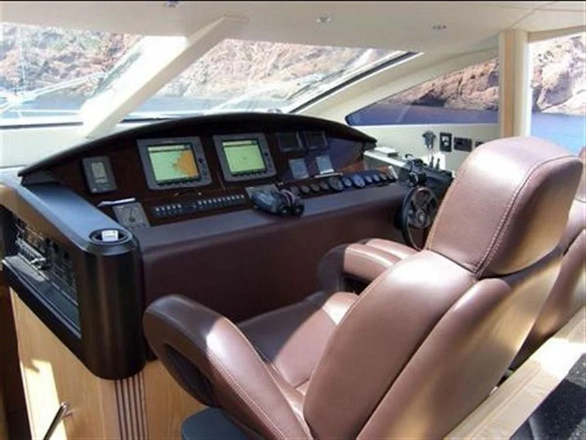 a leather chair in front of a computer aboard 82' SUNSEEKER PREDATOR 82 Yacht for Sale