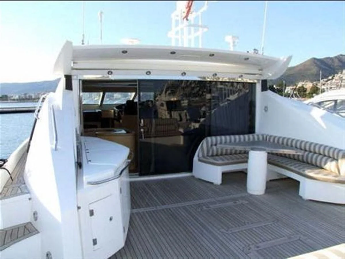 a boat with a deck and a bench on it aboard 82' SUNSEEKER PREDATOR 82 Yacht for Sale