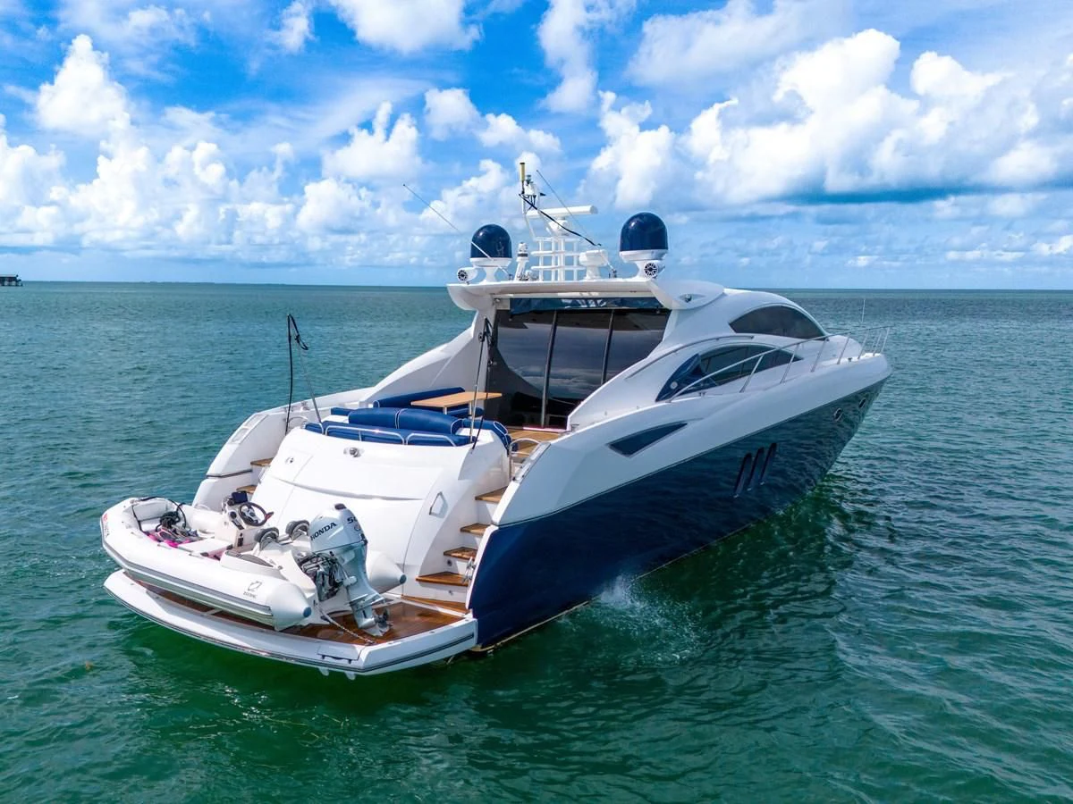 a white yacht in the water aboard 82' SUNSEEKER PREDATOR 82 Yacht for Sale