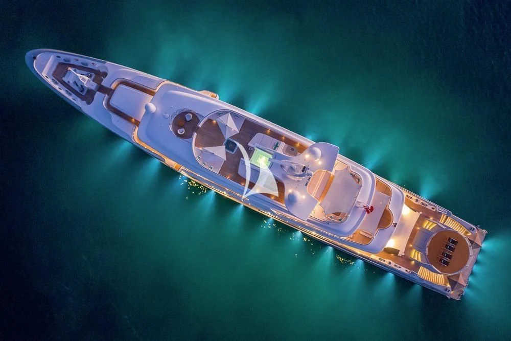 a close-up of a guitar aboard SIREN Yacht for Sale