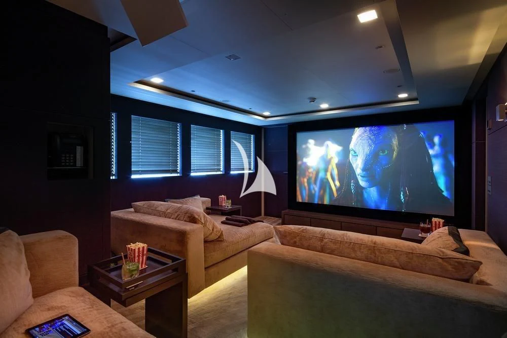 a living room with a tv aboard SIREN Yacht for Sale