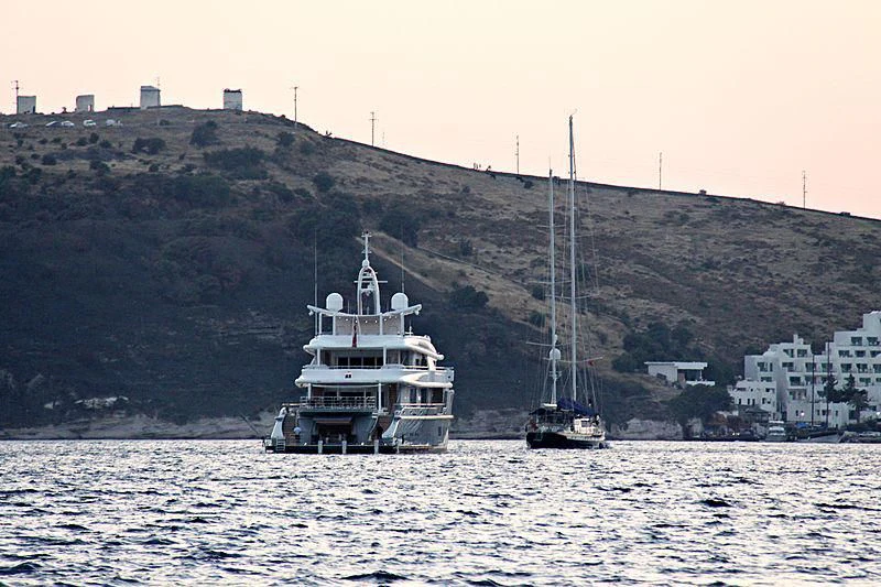 a boat sailing on the water aboard SIREN Yacht for Sale