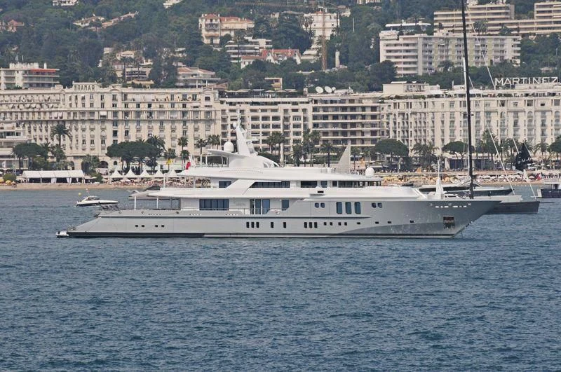 a white boat in the water aboard SIREN Yacht for Sale