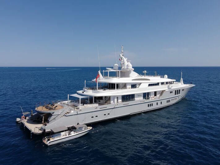 a large white boat in the water aboard SIREN Yacht for Sale