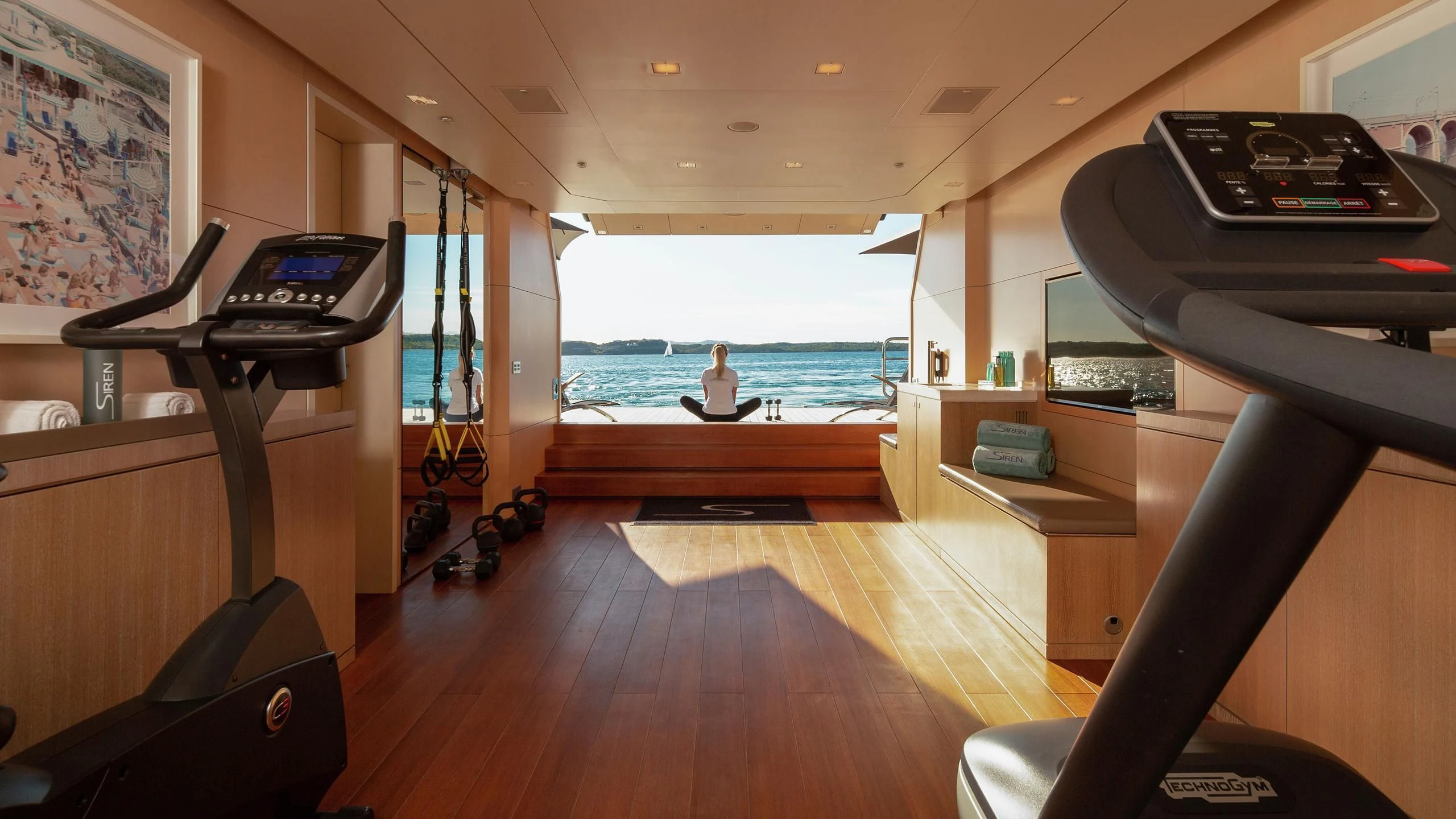 a room with a desk and a computer aboard SIREN Yacht for Sale