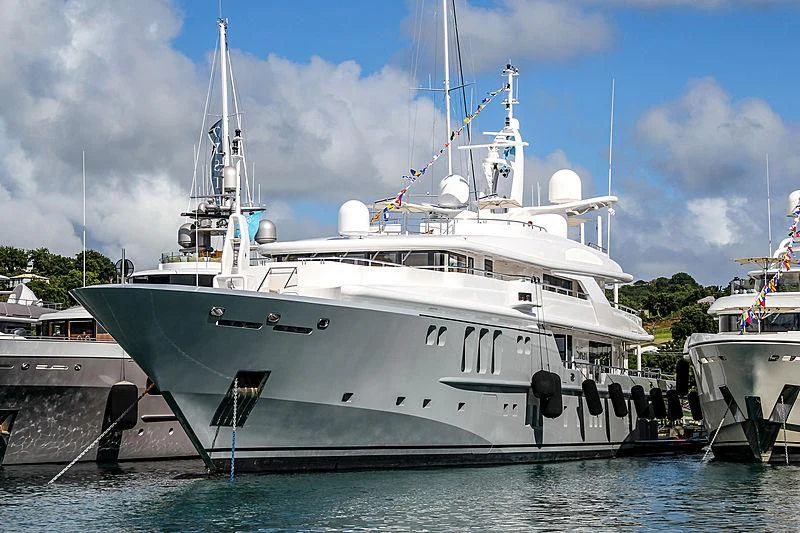 a couple of boats are parked in the water aboard SIREN Yacht for Sale