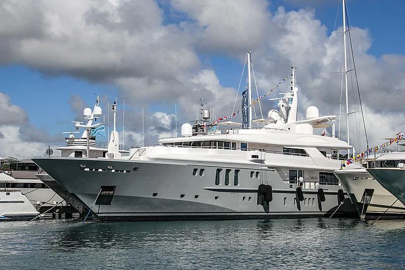 a large white boat in the water aboard SIREN Yacht for Sale