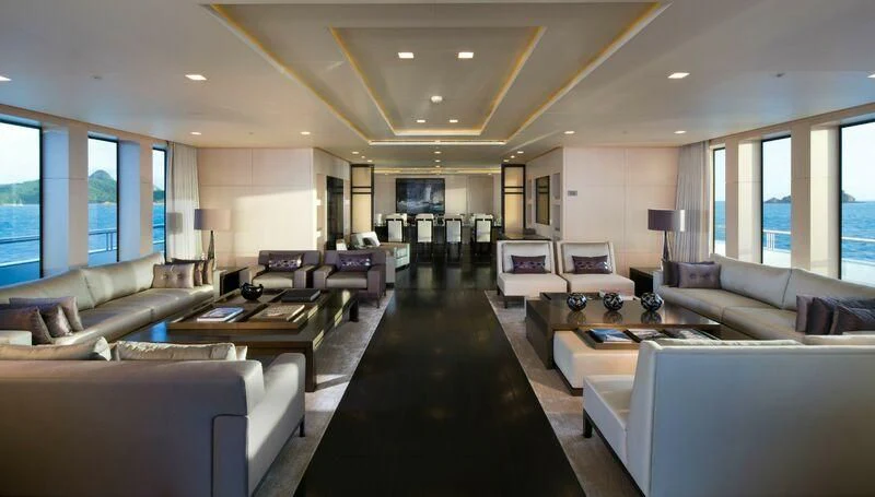 a living room with a large window aboard SIREN Yacht for Sale