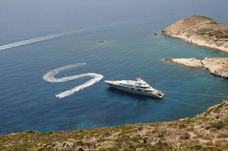 a boat sailing on the sea aboard SIREN Yacht for Sale