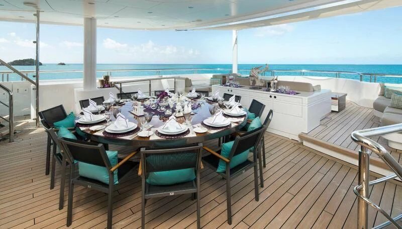 a table set for a meal aboard SIREN Yacht for Sale
