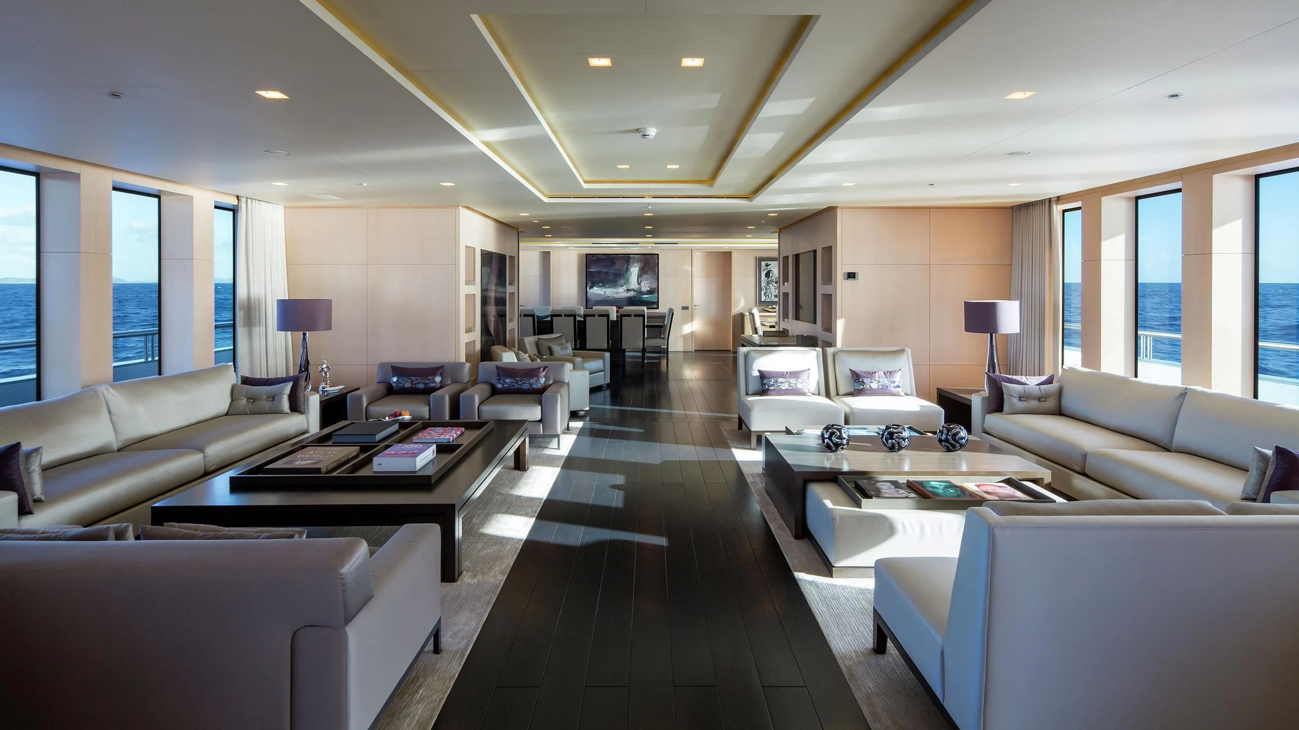 a living room with a large open floor plan aboard SIREN Yacht for Sale