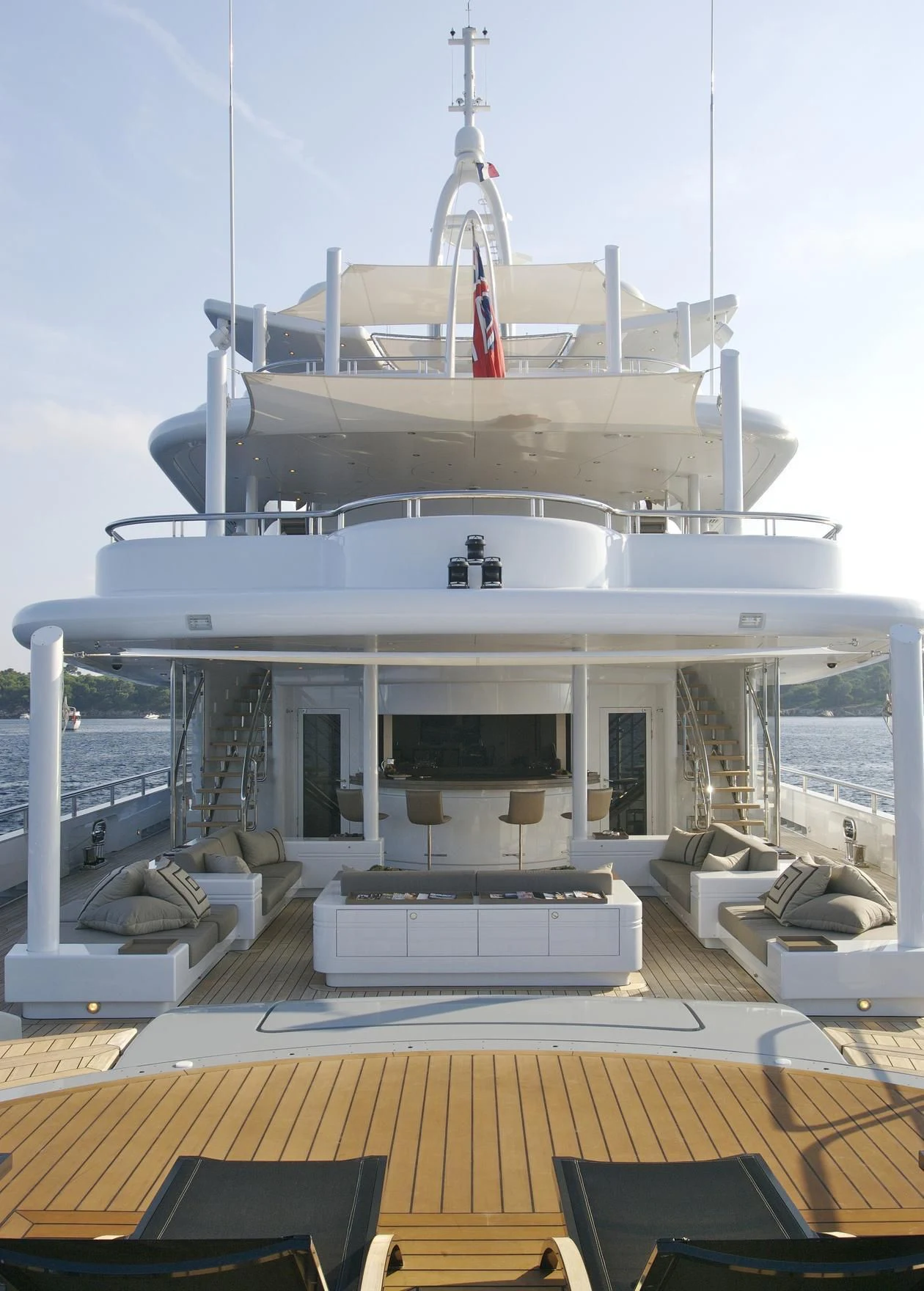 a large white ship with a deck aboard SIREN Yacht for Sale