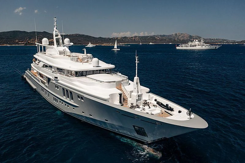 a large white boat in the water aboard SIREN Yacht for Sale