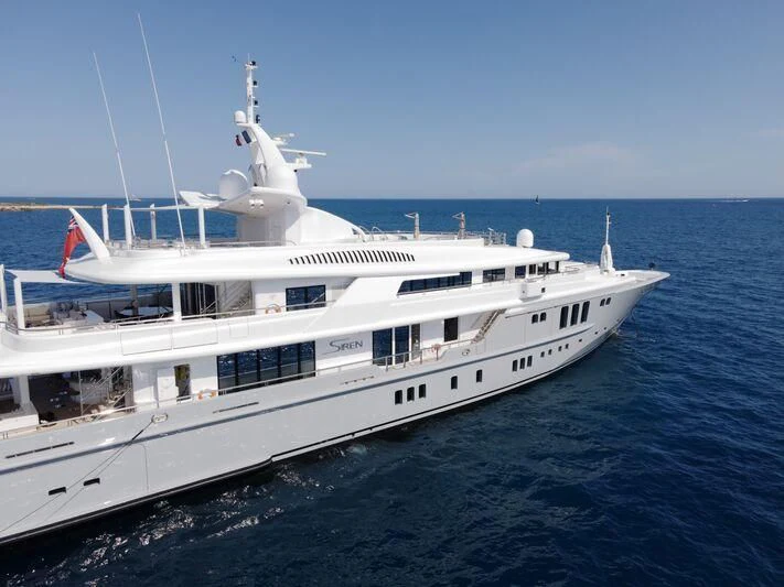 a large white yacht aboard SIREN Yacht for Sale