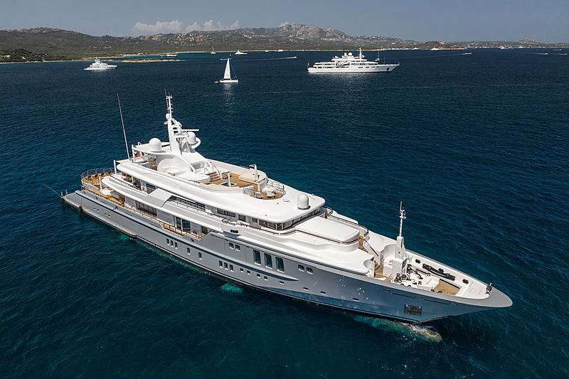 a large boat in the water aboard SIREN Yacht for Sale