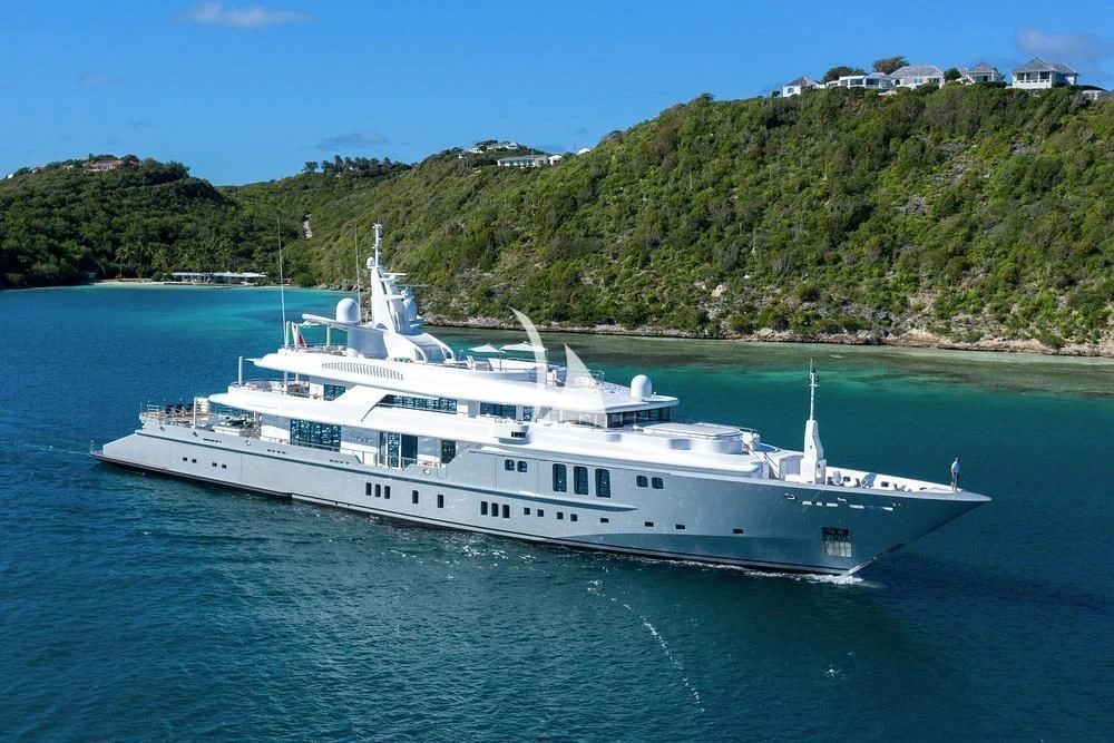 a white yacht on the water aboard SIREN Yacht for Sale