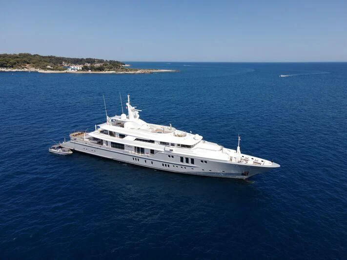 a white boat in the water aboard SIREN Yacht for Sale