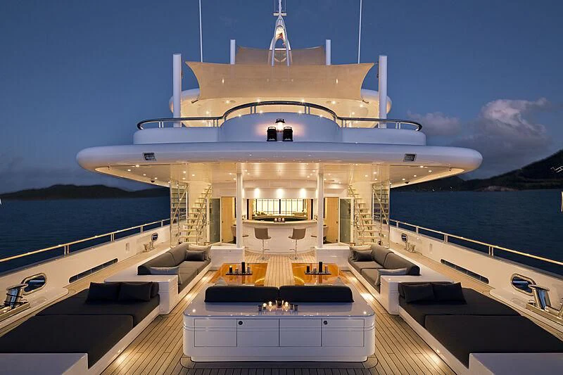 a large ship on the water aboard SIREN Yacht for Sale