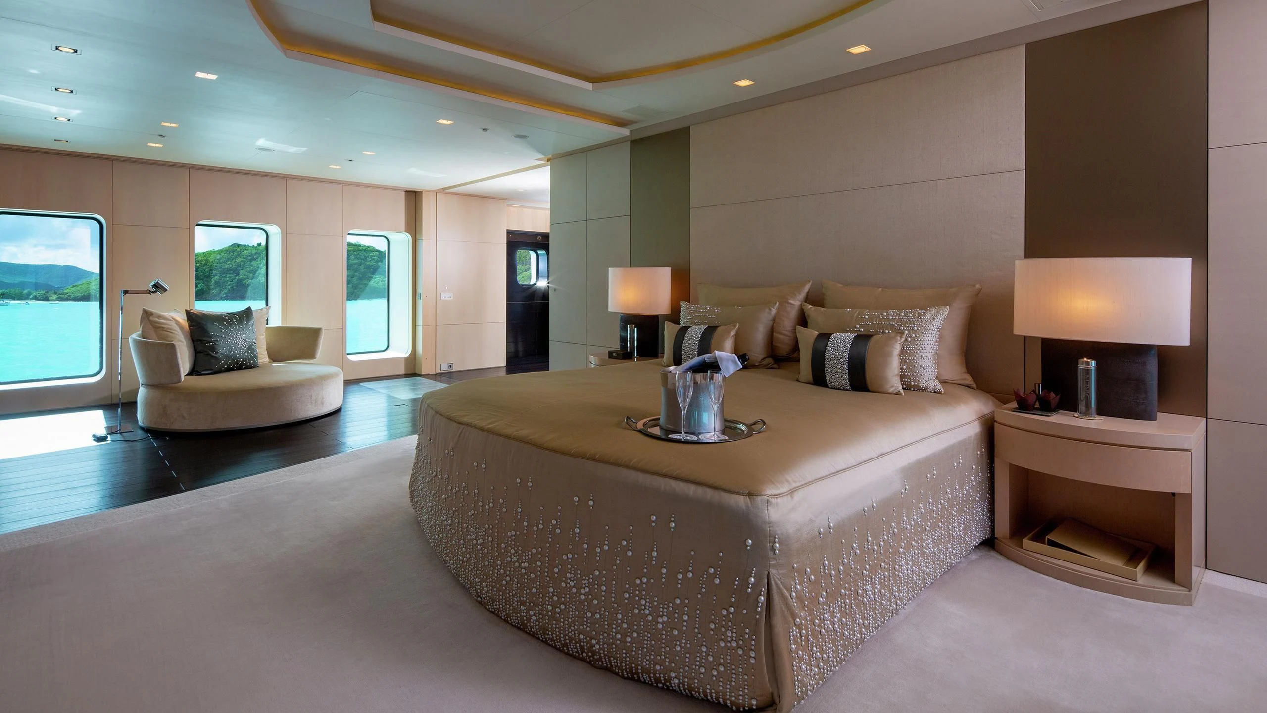 a large bedroom with a large bed aboard SIREN Yacht for Sale