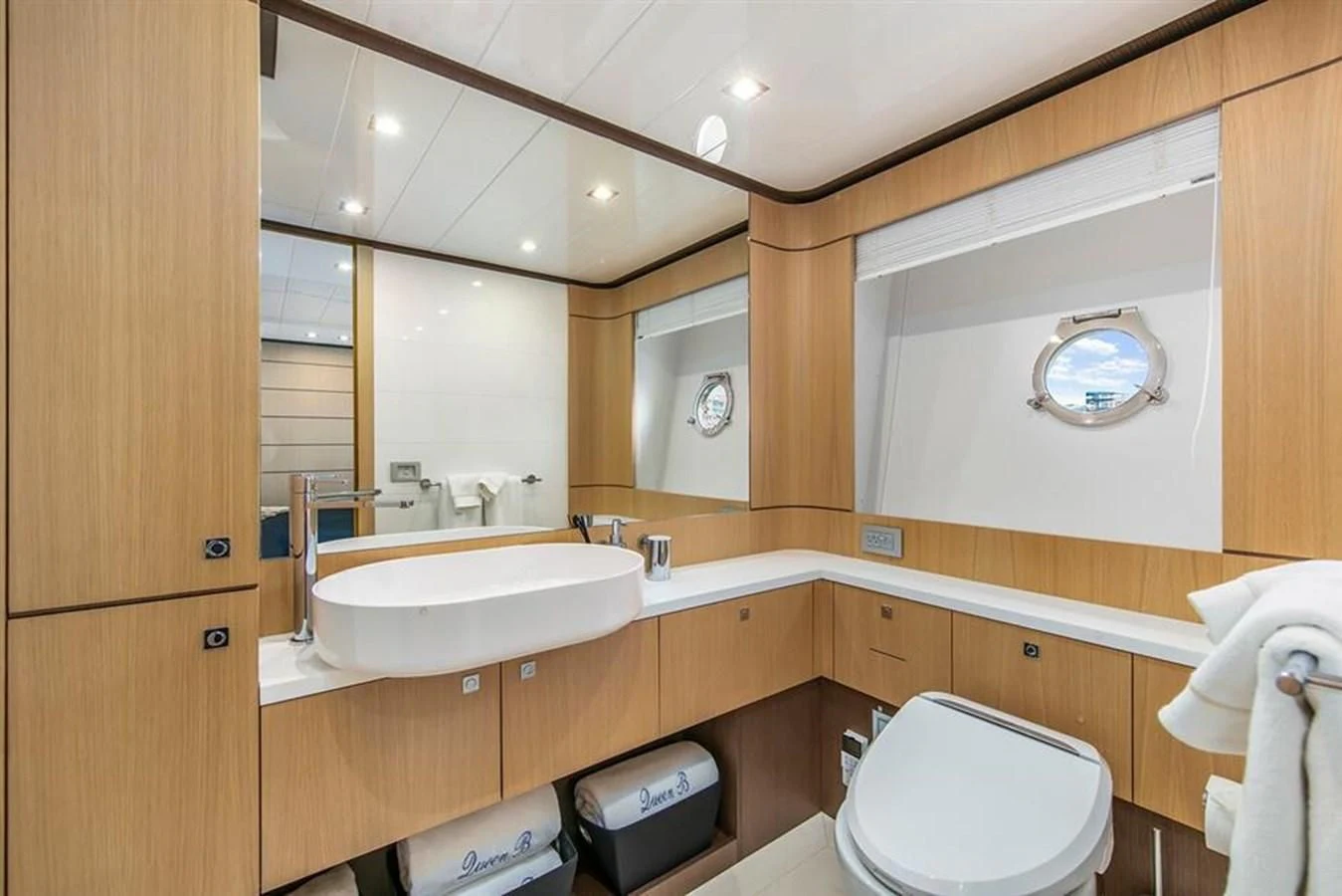 a bathroom with a sink and toilet aboard LONTANO Yacht for Sale