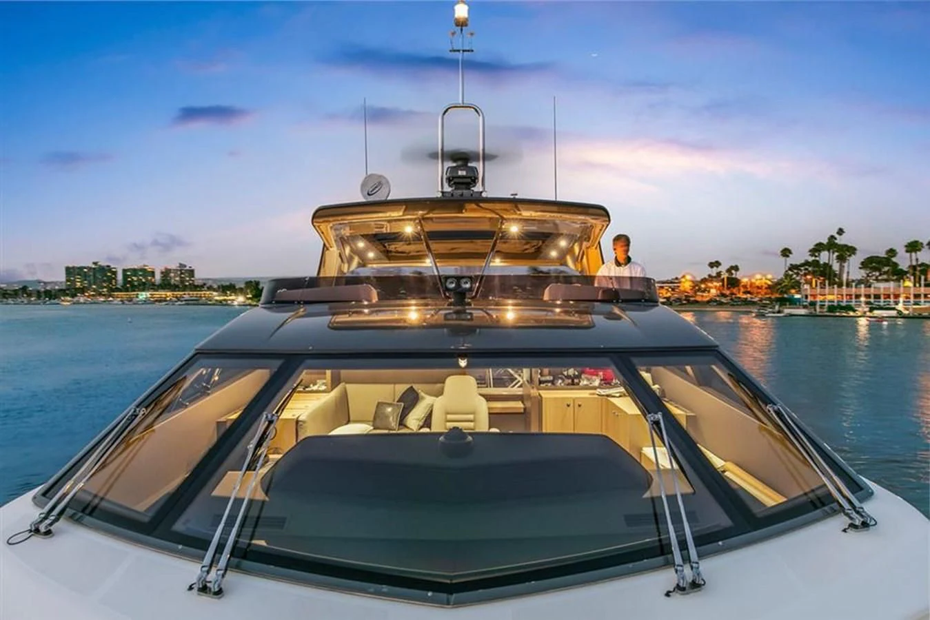 a boat with a large yellow boat on the water aboard LONTANO Yacht for Sale