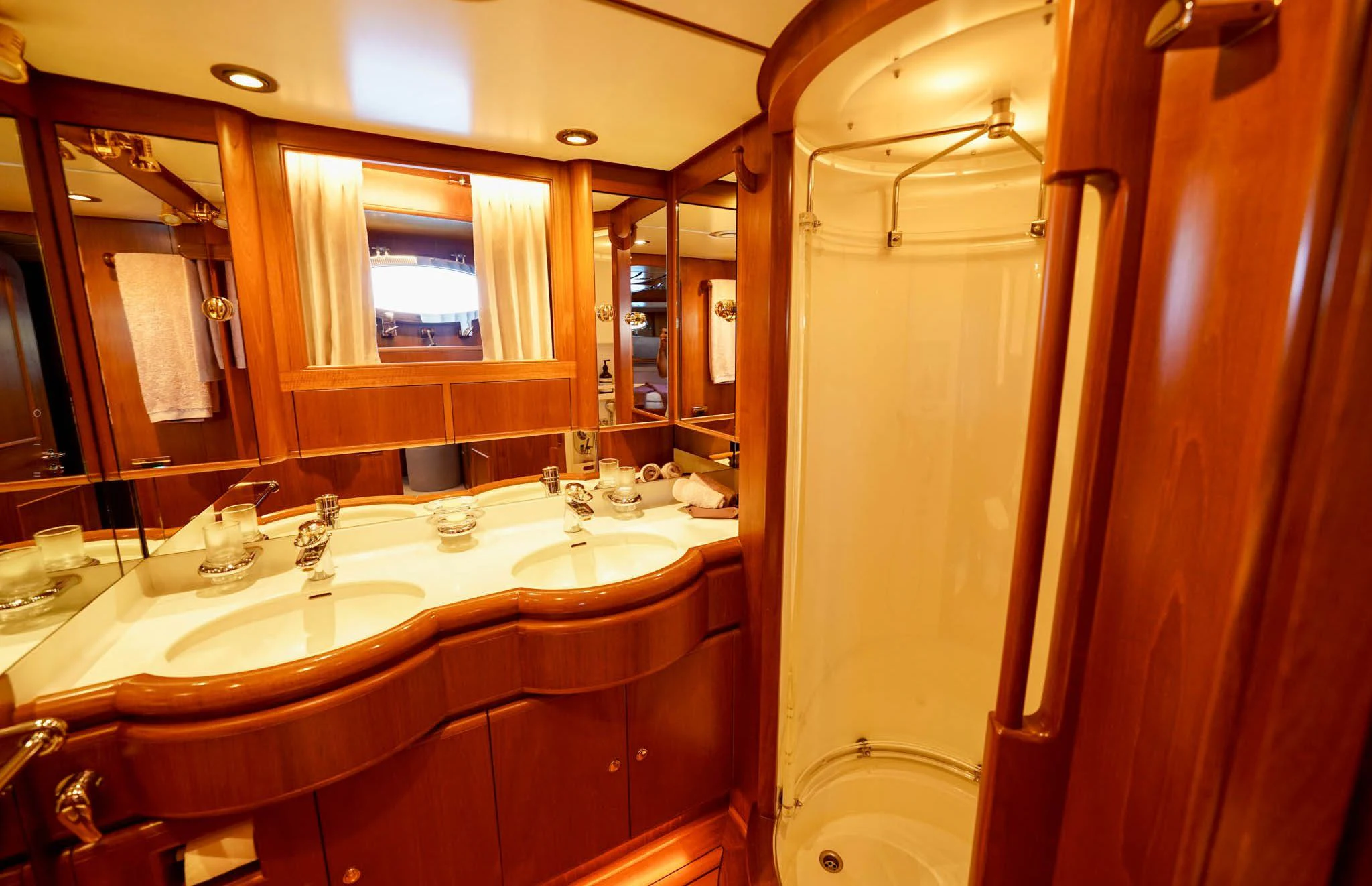 a bathroom with a large mirror aboard JERSEY PEARL Yacht for Sale