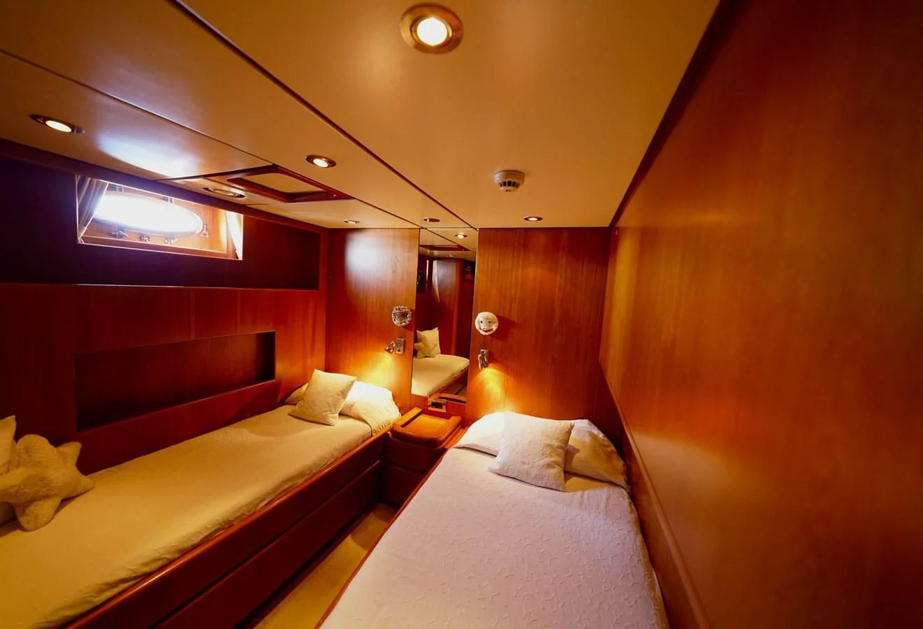 a room with two beds aboard JERSEY PEARL Yacht for Sale