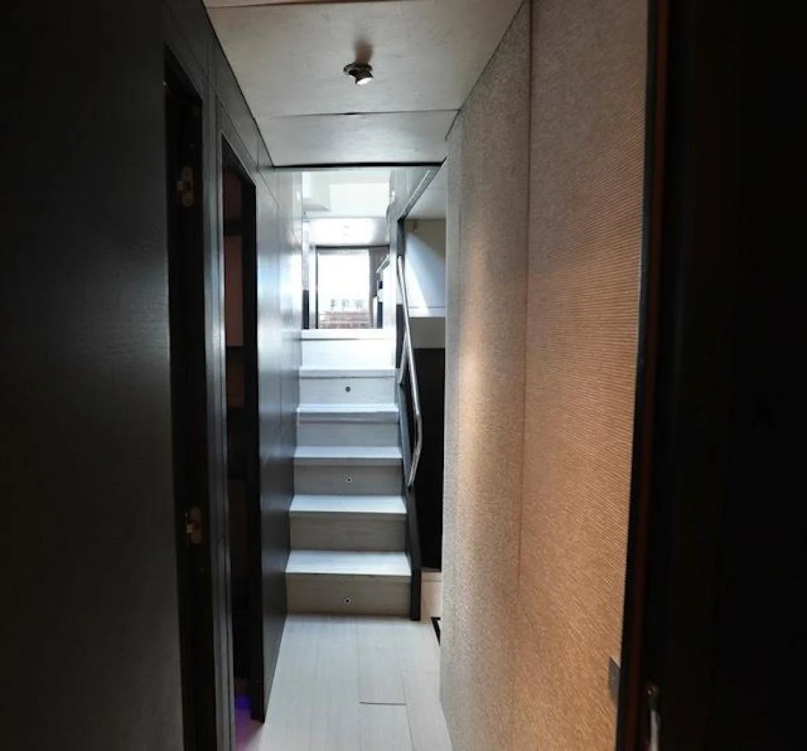 a hallway with a set of doors aboard K3 Yacht for Sale