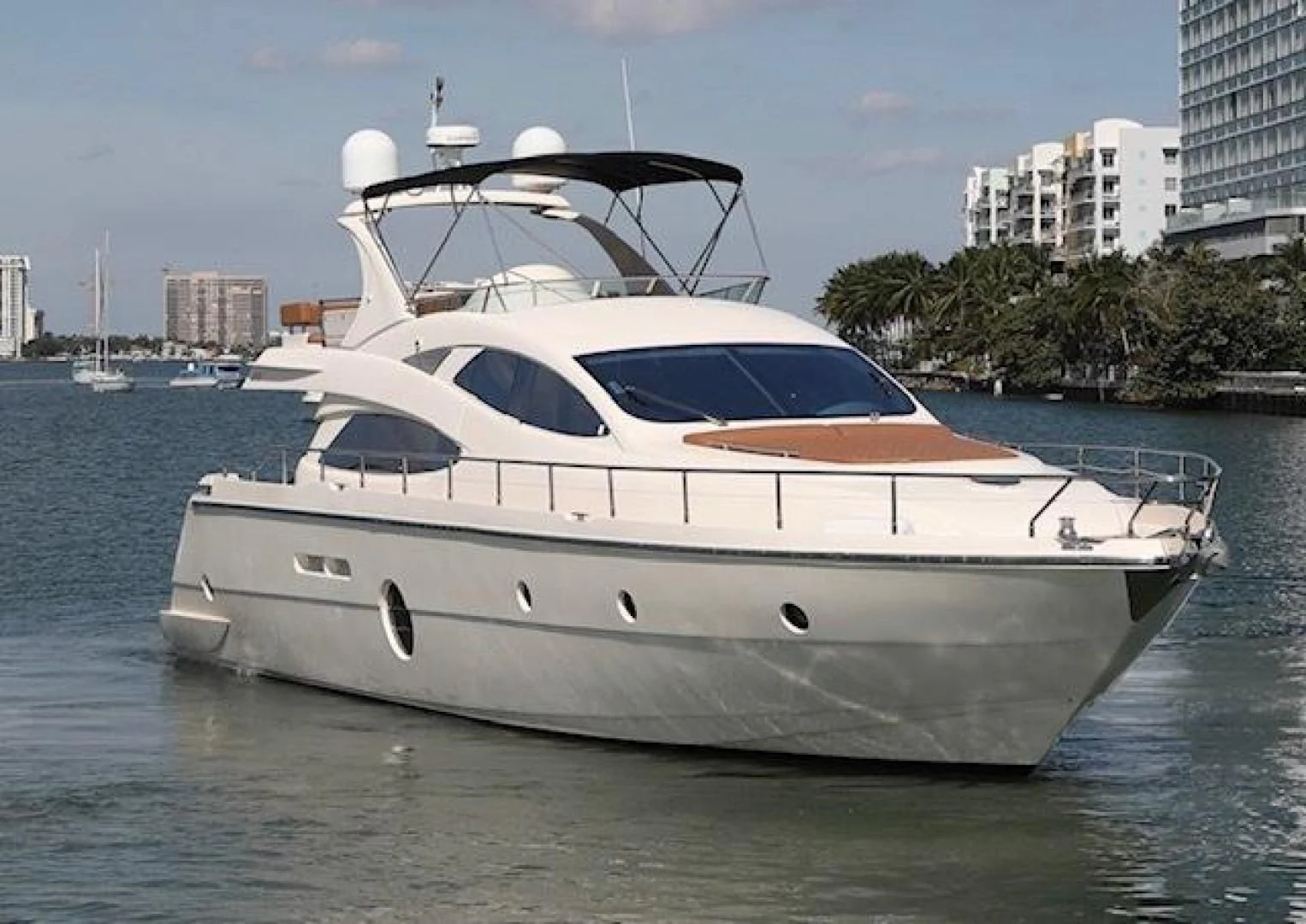 a white yacht in the water aboard K3 Yacht for Sale