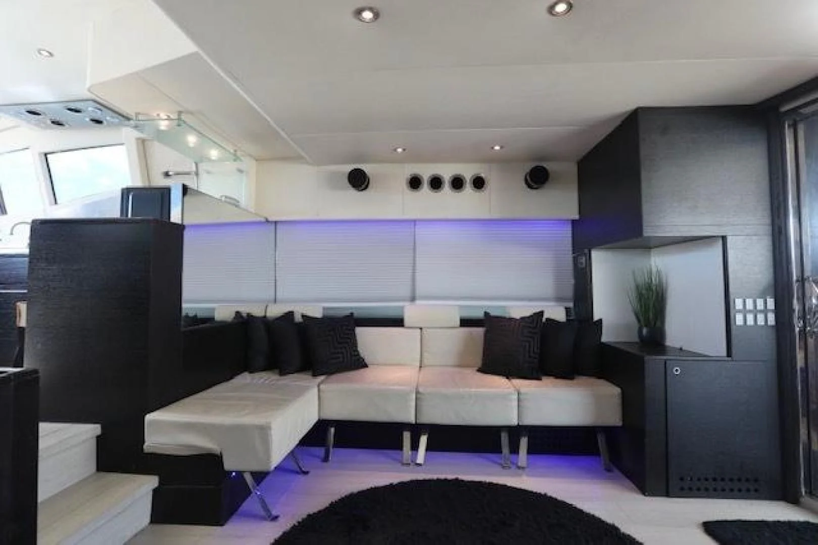 a room with a couch and a tv aboard K3 Yacht for Sale