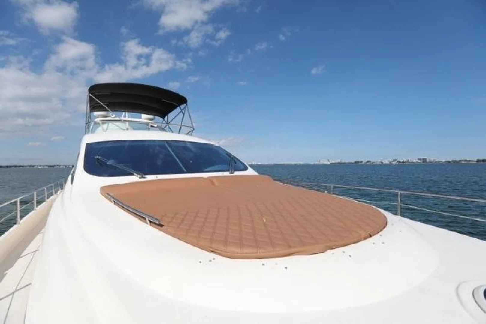 a white car with a roof aboard K3 Yacht for Sale