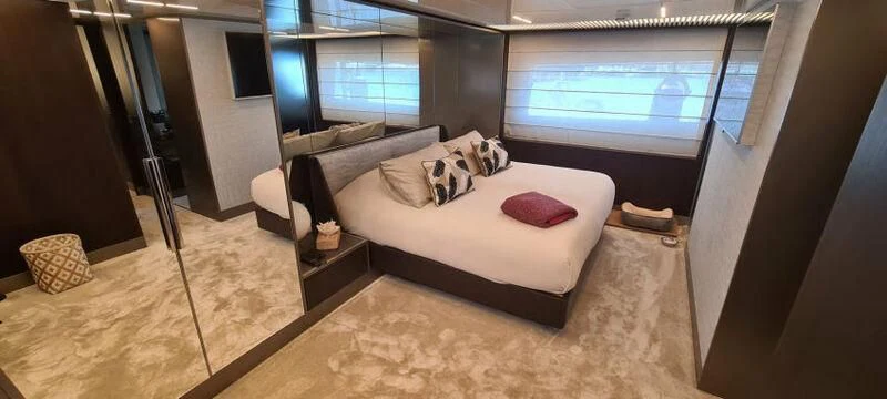 a bed in a room aboard WATERMACHINE Yacht for Sale