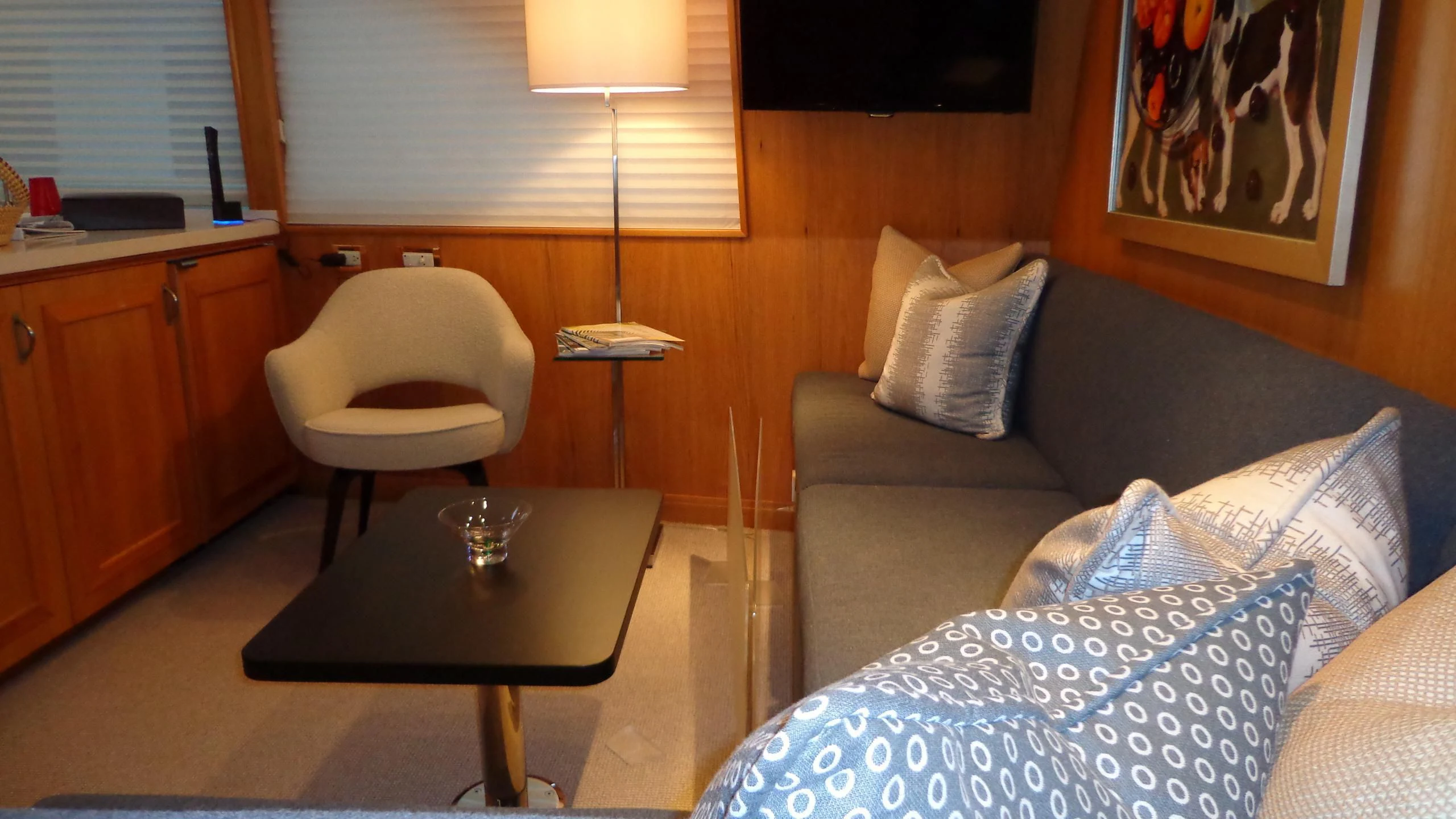 a living room with a couch and a table aboard VIAGGIO Yacht for Sale