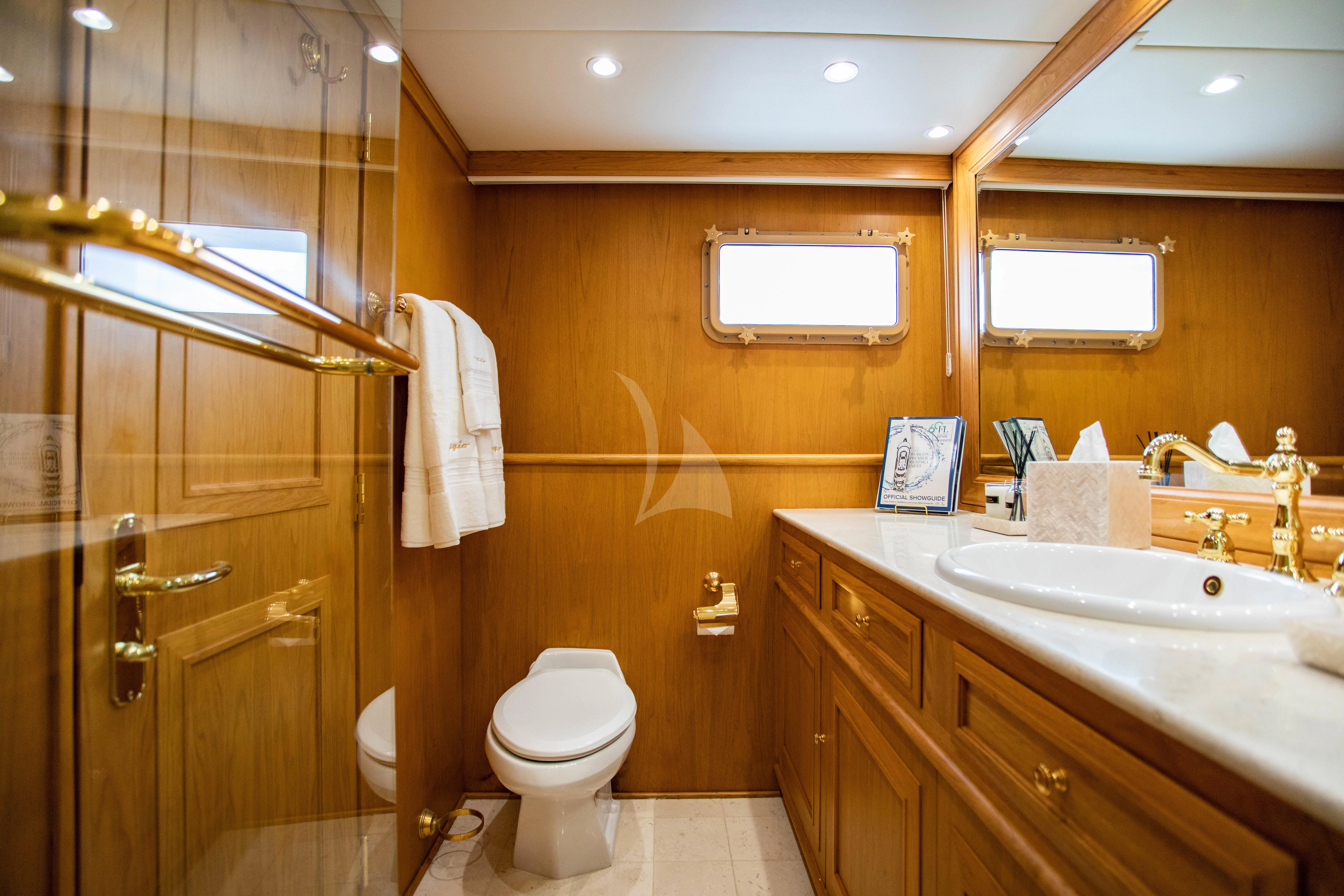 a bathroom with a standup shower aboard VIAGGIO Yacht for Sale