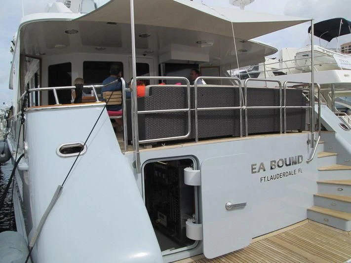 a person sitting on a chair in a room with a large white object aboard VIAGGIO Yacht for Sale