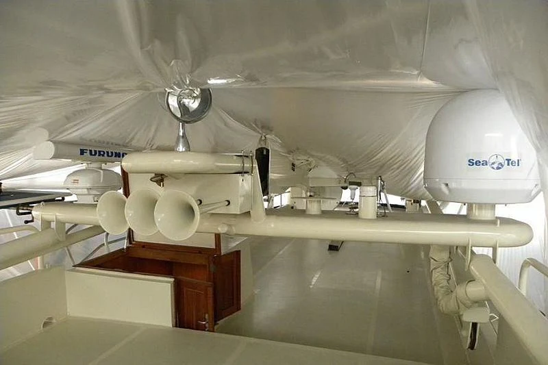 a white machine with pipes aboard TRINTEL Yacht for Sale