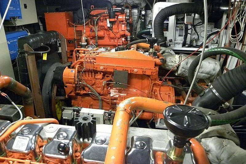 a machine with orange parts aboard TRINTEL Yacht for Sale