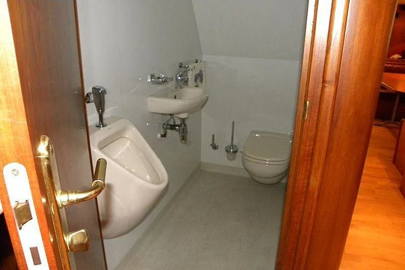 a bathroom with a sink toilet and bathtub aboard TRINTEL Yacht for Sale