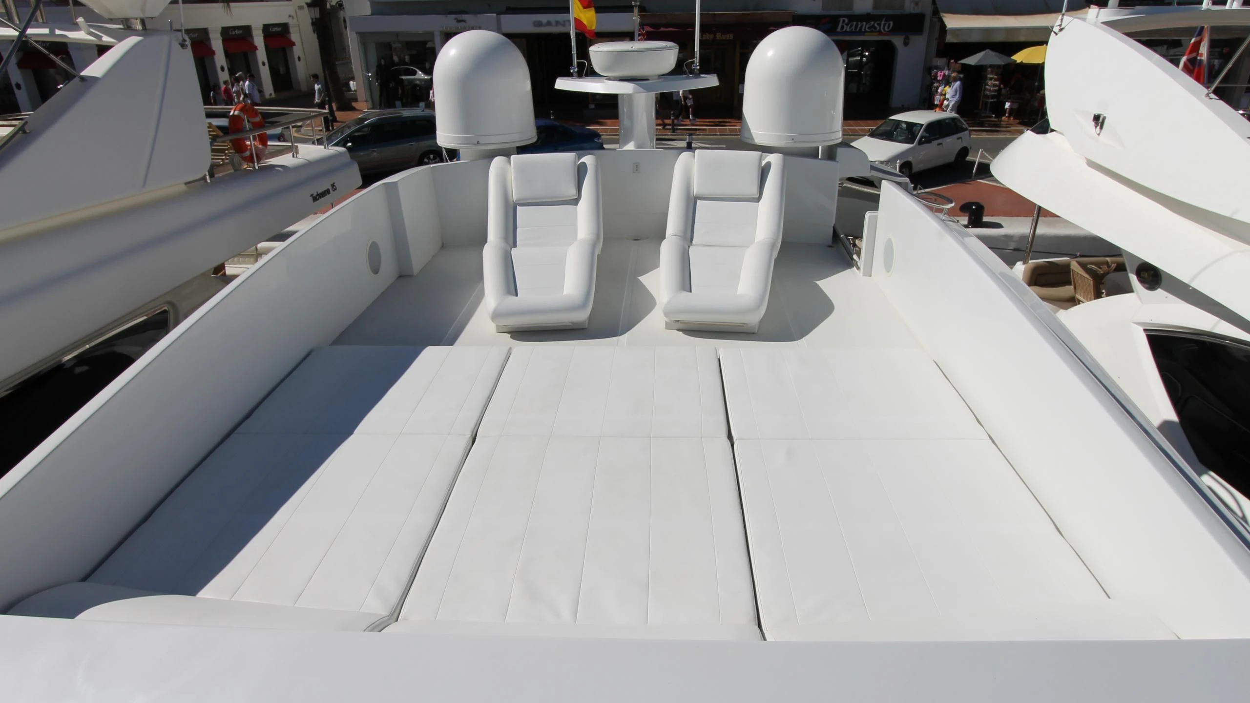 a room with chairs and tables aboard A&O Yacht for Sale