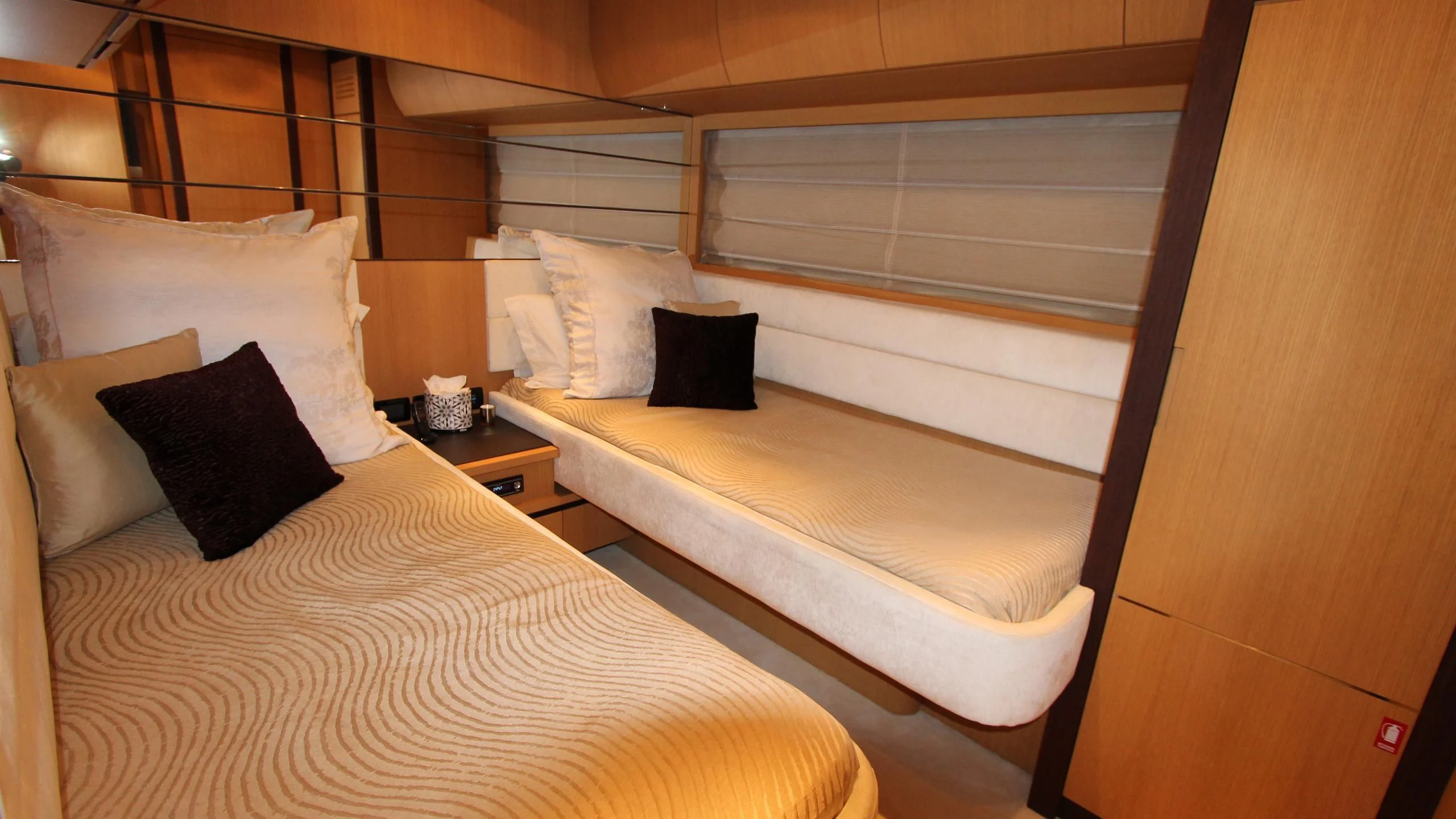 a couple of beds in a room aboard A&O Yacht for Sale