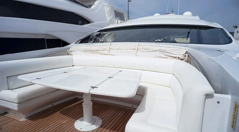 a white car with a white roof aboard A&O Yacht for Sale