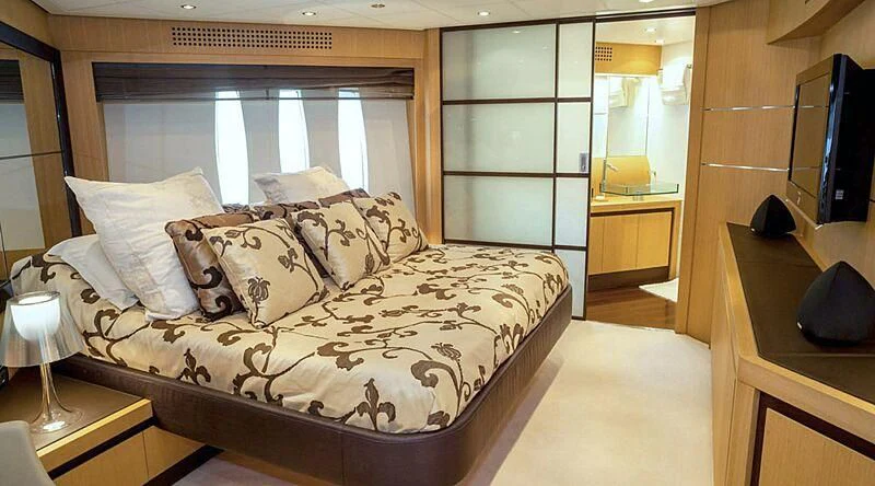 a bed in a room aboard A&O Yacht for Sale