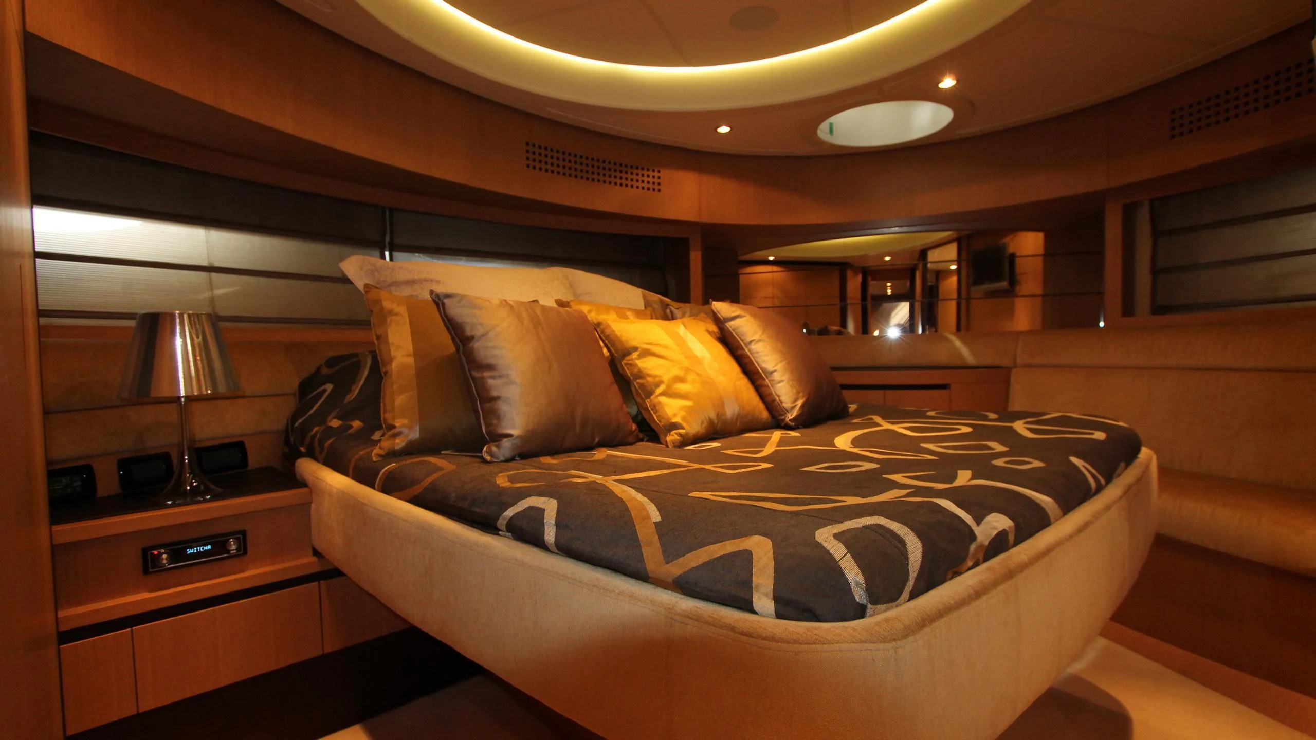 a bed with pillows aboard A&O Yacht for Sale