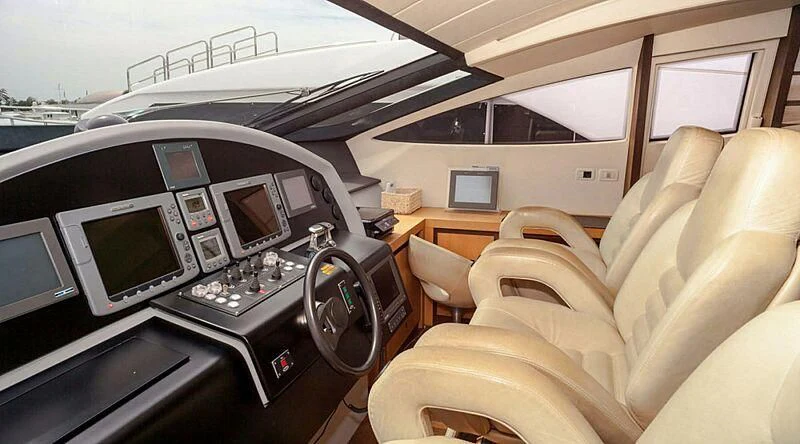 a car with a desk and a bed aboard A&O Yacht for Sale