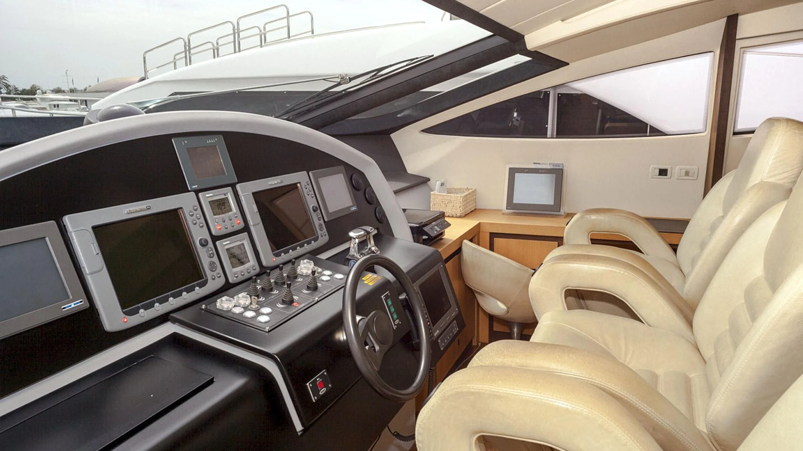 a car with a couple of monitors aboard A&O Yacht for Sale
