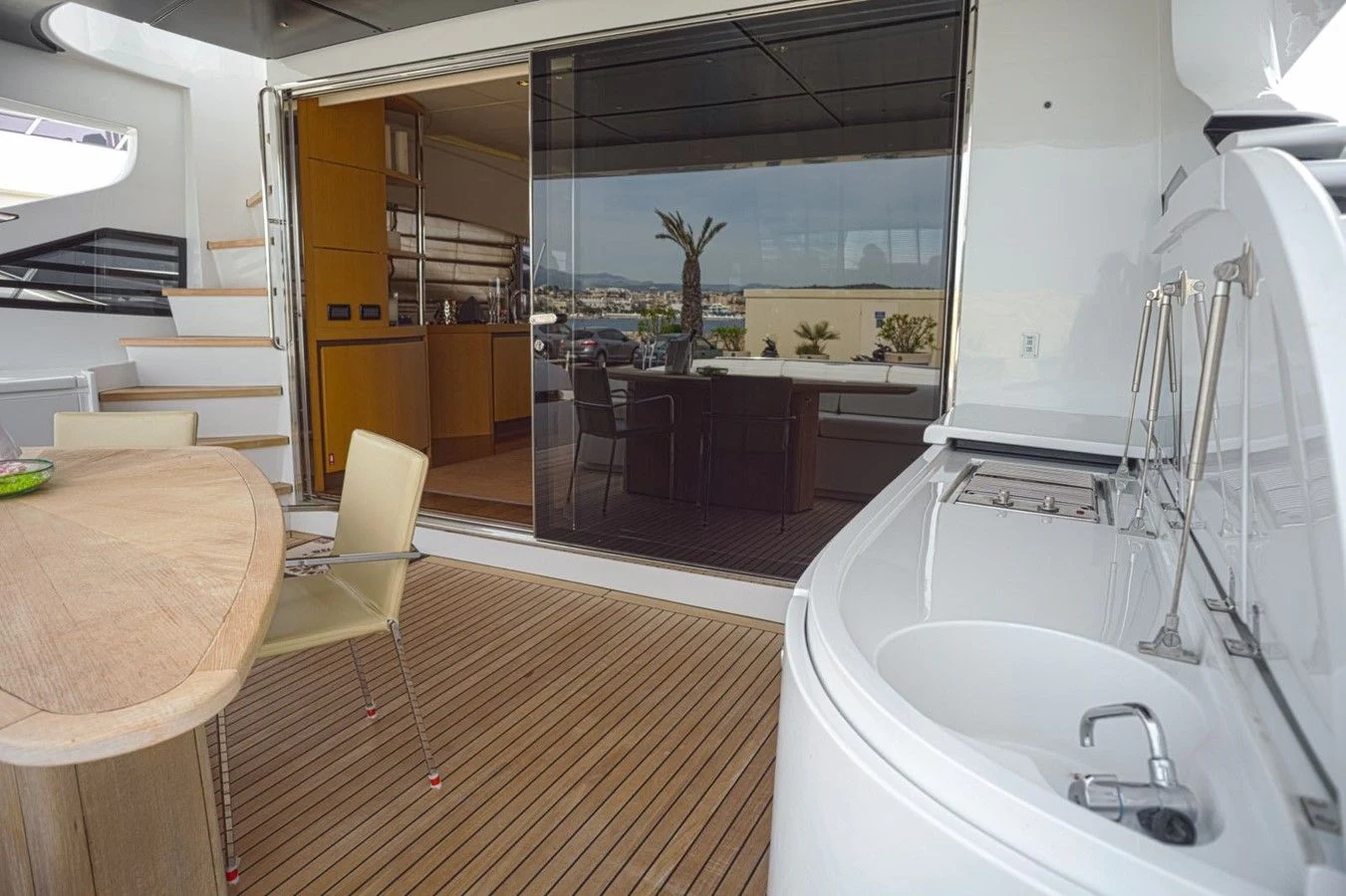 a modern looking kitchen with a large open door aboard A&O Yacht for Sale