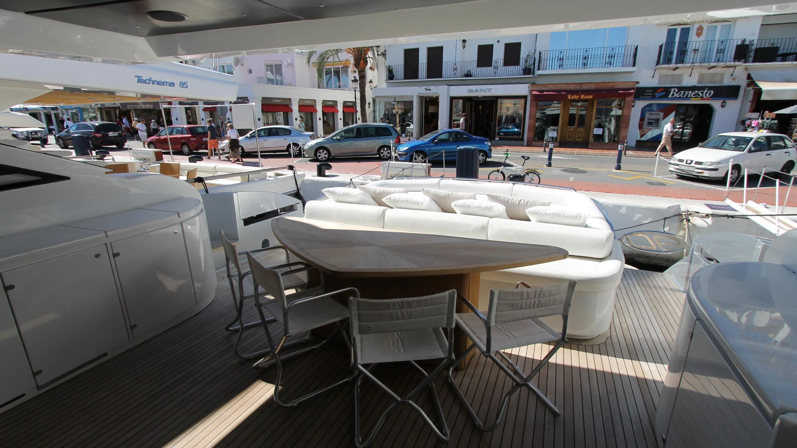 a table and chairs in a store aboard A&O Yacht for Sale
