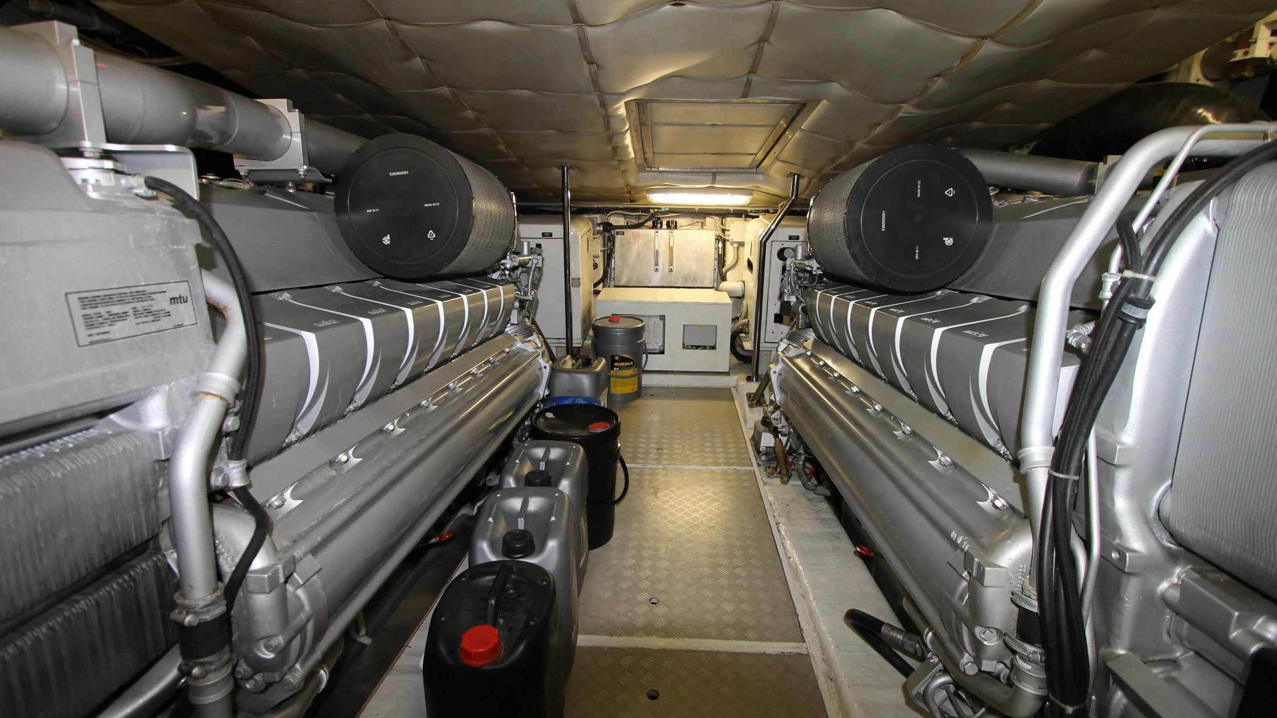a large room with large grey tires aboard A&O Yacht for Sale