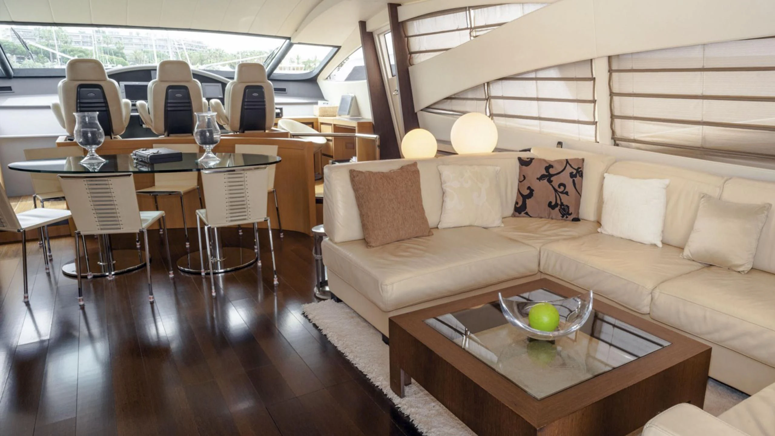 a living room with a couch and a table aboard A&O Yacht for Sale