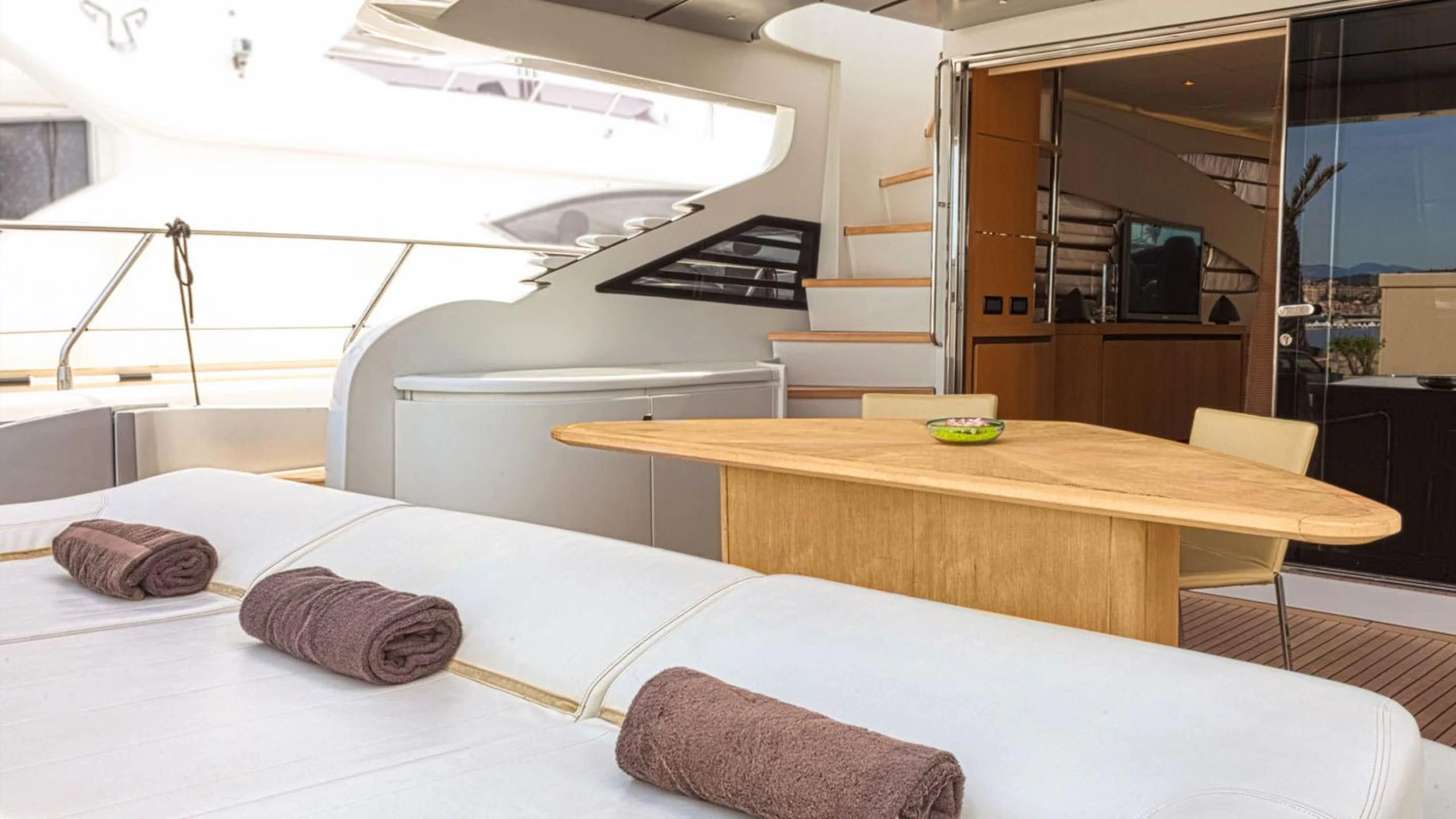 a room with a table and chairs aboard A&O Yacht for Sale
